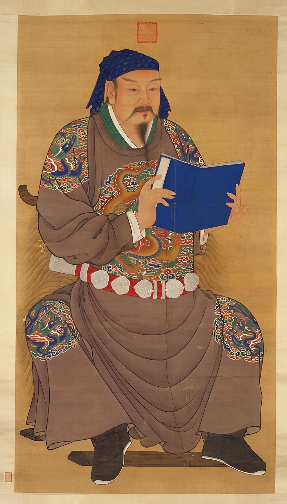 明代《岳飞像》轴:岳飞头戴四带巾、身穿蟒袍、手捧书册,端坐交椅之上